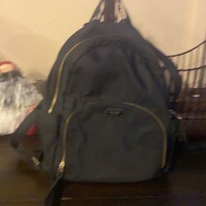Kate Spade black with gold zippers medium size backpack in good condition!